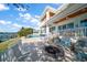 Expansive patio with fire pit and infinity pool at 477 20Th Ave, Indian Rocks Beach, FL 33785