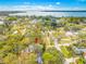 Wide lot near the water, showcasing the home's peaceful setting at 505 Jefferson S Ave, Oldsmar, FL 34677