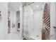 Clean bathroom with walk-in shower and tiled walls at 505 Jefferson S Ave, Oldsmar, FL 34677