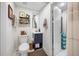 Stylish bathroom, navy vanity and walk-in shower at 505 Jefferson S Ave, Oldsmar, FL 34677