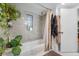 Clean bathroom with a shower/tub combo and a window at 505 Jefferson S Ave, Oldsmar, FL 34677