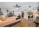 Bright bedroom featuring a walk-in closet and access to patio at 505 Jefferson S Ave, Oldsmar, FL 34677