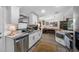 Updated kitchen featuring white cabinets and granite countertops at 505 Jefferson S Ave, Oldsmar, FL 34677