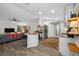 Modern kitchen with white cabinets, granite countertops, and stainless steel appliances at 505 Jefferson S Ave, Oldsmar, FL 34677