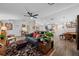 Spacious living area with hardwood floors, open floor plan, and stylish decor at 505 Jefferson S Ave, Oldsmar, FL 34677