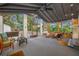 Relaxing screened porch with comfortable seating at 505 Jefferson S Ave, Oldsmar, FL 34677