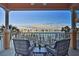 Relaxing balcony with waterfront views and seating for two at 530 S Gulfview Blvd # 205, Clearwater, FL 33767