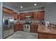 Well-equipped kitchen featuring granite counters and stainless steel appliances at 530 S Gulfview Blvd # 205, Clearwater, FL 33767