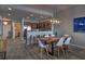 Modern kitchen with stainless steel appliances and dark wood cabinets at 530 S Gulfview Blvd # 205, Clearwater, FL 33767