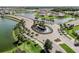 Aerial view of community, showcasing homes and waterways at 5322 Windy Grove Dr, Wimauma, FL 33598