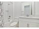 Modern bathroom with white cabinets and a quartz countertop at 5322 Windy Grove Dr, Wimauma, FL 33598