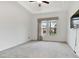 Bright bedroom with carpet and large windows at 5322 Windy Grove Dr, Wimauma, FL 33598