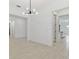 Elegant dining room with a modern chandelier and an open floor plan at 5322 Windy Grove Dr, Wimauma, FL 33598