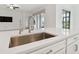 Kitchen island with a large sink and modern faucet at 5322 Windy Grove Dr, Wimauma, FL 33598