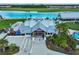 Beach club style clubhouse at entrance to lagoon pool at 5322 Windy Grove Dr, Wimauma, FL 33598