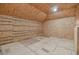 Unfinished attic storage space with OSB walls and floor at 5322 Windy Grove Dr, Wimauma, FL 33598