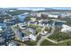 Wide aerial view of waterfront community, showing the neighborhood and marina at 5736 Biscayne Ct # 3, New Port Richey, FL 34652
