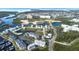 Wide aerial view of the waterfront community, including the neighborhood and marina at 5736 Biscayne Ct # 3, New Port Richey, FL 34652
