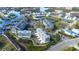 Aerial view of waterfront community, featuring townhouses and marina at 5736 Biscayne Ct # 3, New Port Richey, FL 34652