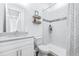 Clean bathroom with shower/tub combo, vanity, and toilet at 5736 Biscayne Ct # 3, New Port Richey, FL 34652