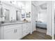 Bathroom with single vanity and view of bedroom at 5736 Biscayne Ct # 3, New Port Richey, FL 34652