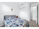Small bedroom with a single bed and closet at 5736 Biscayne Ct # 3, New Port Richey, FL 34652