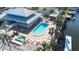 Aerial view showing clubhouse, pool, and hot tub at 5736 Biscayne Ct # 3, New Port Richey, FL 34652