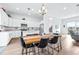 Dining room with rustic wood table and black chairs at 5736 Biscayne Ct # 3, New Port Richey, FL 34652