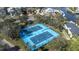 Community tennis courts with four courts, well-maintained and fenced at 5736 Biscayne Ct # 3, New Port Richey, FL 34652