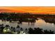 Stunning aerial view of cityscape at sunset, offering breathtaking water and city skyline views at 670 Island Way # 500, Clearwater Beach, FL 33767