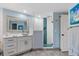 Spa-like bathroom with a modern vanity and shower at 670 Island Way # 500, Clearwater Beach, FL 33767