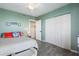Bedroom with a full-size bed and built-in closet at 670 Island Way # 500, Clearwater Beach, FL 33767