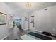Home exercise room with yoga mats and weights at 670 Island Way # 500, Clearwater Beach, FL 33767