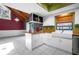 Kitchen with farmhouse sink and ample counter space at 705 Whiteway Dr, Brooksville, FL 34601