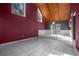 Spacious living room with high ceilings and wood beams at 705 Whiteway Dr, Brooksville, FL 34601