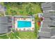 Community pool and surrounding buildings from above at 706 Haven Pl, Tarpon Springs, FL 34689