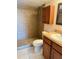Clean bathroom, featuring a shower and updated vanity at 706 Haven Pl, Tarpon Springs, FL 34689