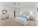 Charming bedroom with a queen-size bed and stylish decor at 899 Bay Esplanade, Clearwater Beach, FL 33767