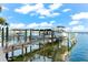 Covered boat lift system with multiple boats and convenient access at 899 Bay Esplanade, Clearwater Beach, FL 33767