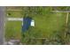Aerial view showing the house and expansive lawn at 908 Victoria St, Brandon, FL 33510