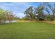 Large grassy backyard with privacy fence at 908 Victoria St, Brandon, FL 33510