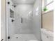 Modern bathroom with a frameless shower and marble tile at 908 Victoria St, Brandon, FL 33510