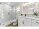 Updated bathroom with marble shower and modern vanity at 908 Victoria St, Brandon, FL 33510