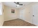 Spacious bedroom featuring tile floors and a ceiling fan at 908 Victoria St, Brandon, FL 33510