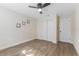 Bright bedroom with ceiling fan and double door closet at 908 Victoria St, Brandon, FL 33510