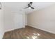 Well-lit bedroom with ceiling fan and double door closet at 908 Victoria St, Brandon, FL 33510