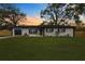 Newly renovated home with modern exterior and landscaping at 908 Victoria St, Brandon, FL 33510
