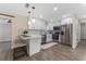 Updated kitchen featuring white shaker cabinets and stainless steel appliances at 908 Victoria St, Brandon, FL 33510