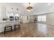 Modern kitchen with white cabinets, stainless steel appliances, and an island at 908 Victoria St, Brandon, FL 33510