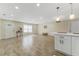 Open concept living room with kitchen and entryway views at 908 Victoria St, Brandon, FL 33510